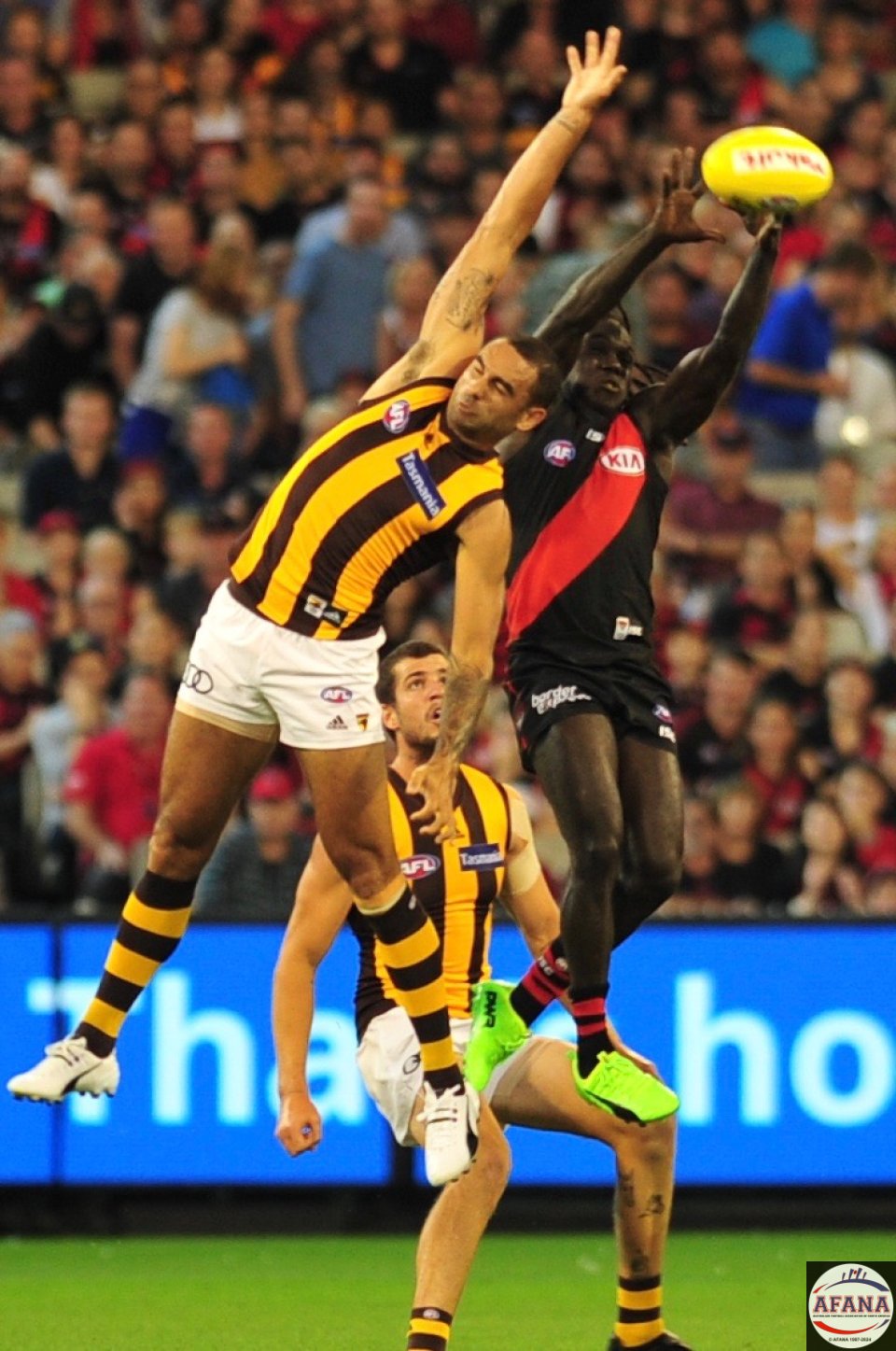 Tippingwuti brings the ball to ground in a contest with Shaun Burgoyne