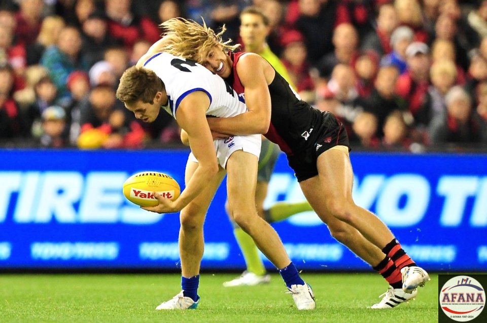 Bastinac is tackled by Heppell
