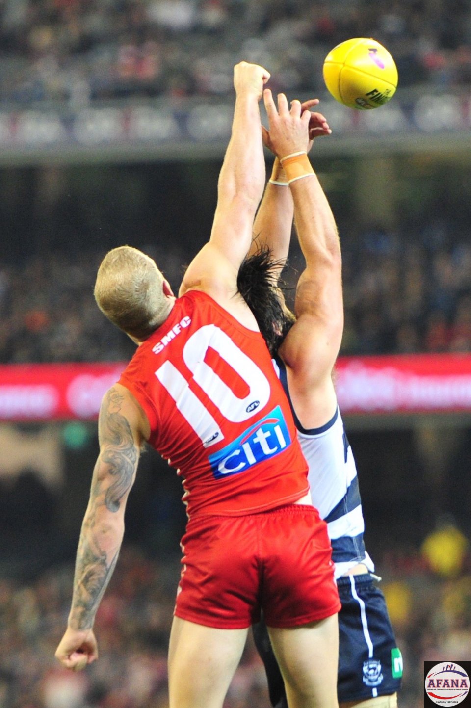 Smith and Bartel conttest the ball