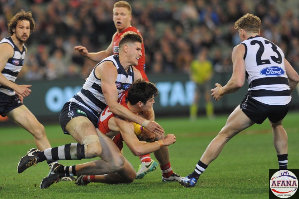 Zak Smith tackles George Hewett as Josh Caddy waits for the crumb